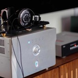 The ATH-ADX7000 are Audio-Technica's most high-end open-backs yet, pictured here next to other high-end audio equipment. (Image source: Kyle for Den-Fi.com)