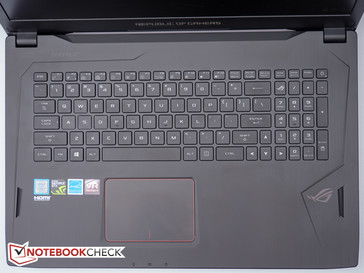 The keyboard features 30-key rollover and 1.8 mm key travel