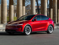 The 2026 Tesla Model Y in motion in Ultra Red. (Image source: Tesla)