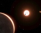 An artist's illustration showing an exoplanet and its star.