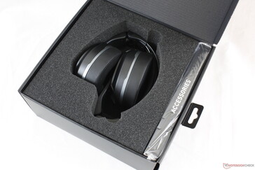 Headphones come folded in the box alongside a smaller box of accessories