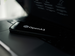 OpenAI logo on a phone