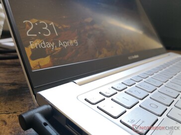 No edge-to-edge glass or touchscreen option. Bottom bezel much thicker than the sides and top