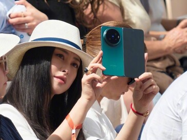 Rumored Vivo X Fold 6 in green colorway held by Chinese actress Zhu Zhu.