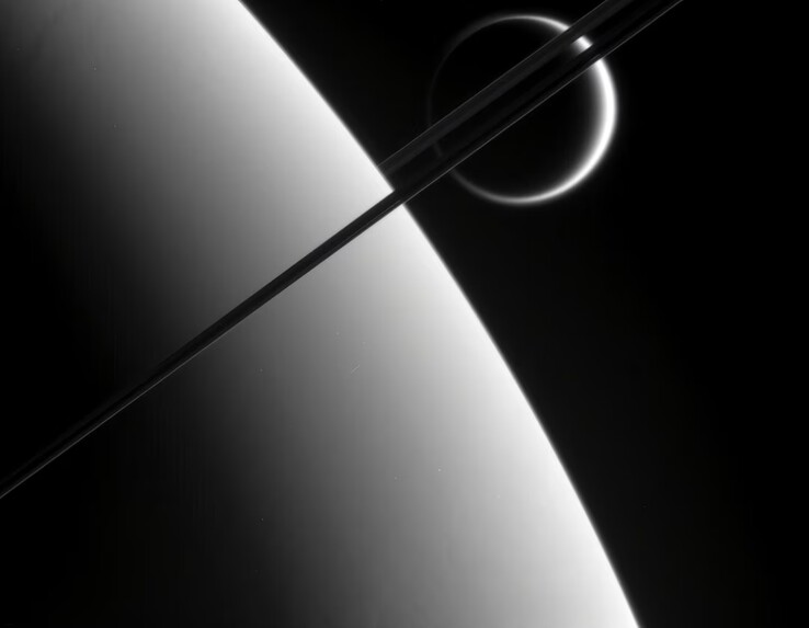 An image showing Titan and Saturn's rings.