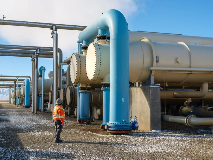 A worker inspects pipes at the Project Red construction site (image: Fervo)