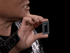 Jensen Huang holding the Nvidia GB10 aloft during CES 2025. (Image source: Hardware Luxx)