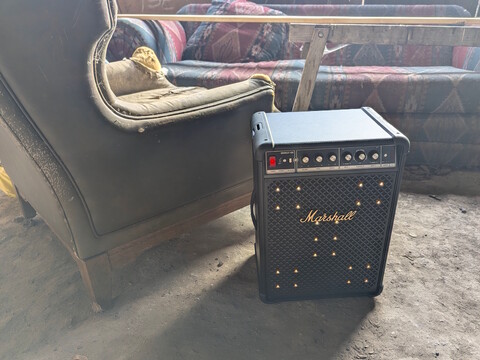 Marshall Bromley 450 in an old barn with an armchair