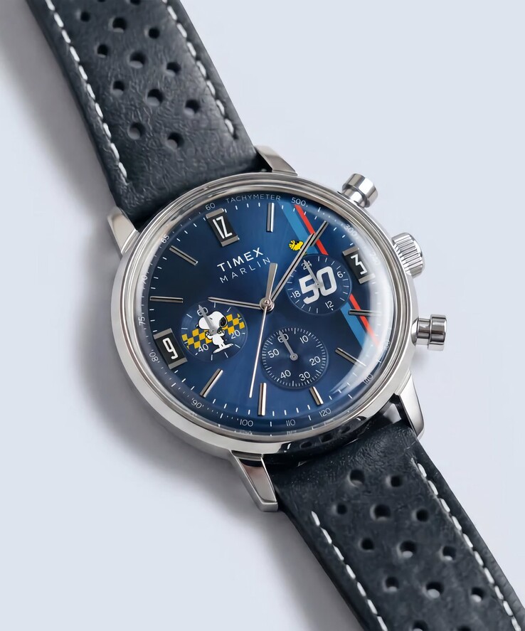 Timex Peanuts x Marlin Chronograph shown at an angle with its polished stainless steel case, blue sunray dial, and perforated blue leather strap.