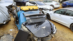 Damaged Tesla at a salvage yard