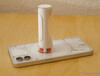 Nothing Ear (stick) charging case on Nothing Phone (1)