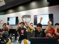 A shot of the action from the G.Skill booth. Toppc is the gentleman on the far left wearing glasses. (Source: G.Skill).