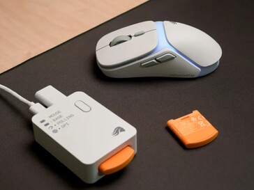 White Glorious Model O3 Wireless with the multipurpose base and spare battery. (Image source: Glorious)