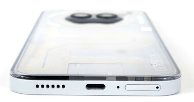 Bottom case side (speaker, USB port, microphone, SIM slot)