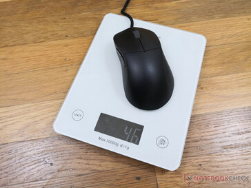 The mouse by itself is about 45 g