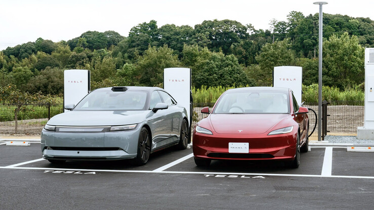 Sony Afeela EV next to a Tesla at a Supercharger station