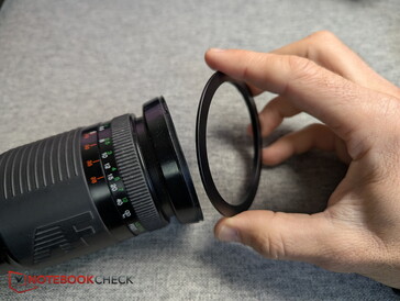 Simply screw the matching adapter ring onto the lens
