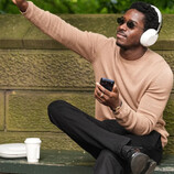Damson Idris wearing Sony's unreleased over-ear headphones.