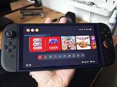 The Nintendo Switch 2 pictured in a user's palm