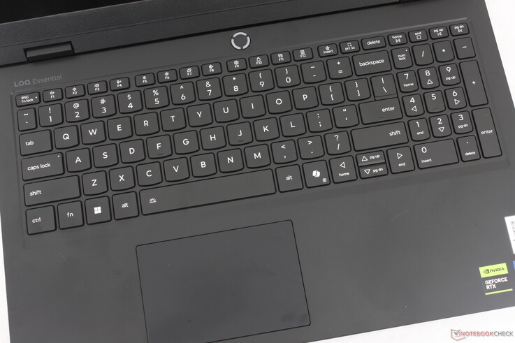 Keyboard with only optional white backlighting, shallow travel with light feedback, and a small 10.5 x 7 cm clickpad