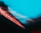 Abstract motion blur of the National Theatre sign in London (Image source: Samuel Regan-Asante via Unsplash)