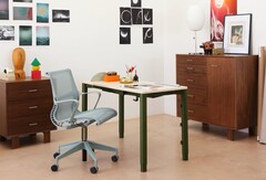 The Spout height-adjustable desk by Herman Miller features four motorised legs. (Image source: Herman Miller)
