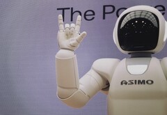 AI might take your job, but at least it'll look cool doing it. (image source: Possessed Photography on Unsplash)