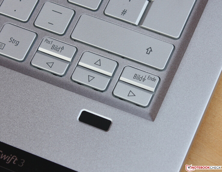 Swipe fingerprint reader below the arrow keys