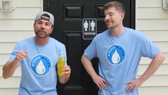 Mark Rober standing beside MrBeast with a can of urine (Image source: MrBeast; cropped screenshot)
