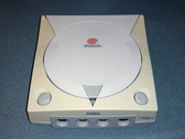 A picture of a yellowing Sega Dreamcast console (image source: Tech Tangents YT)