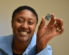 Exec of Intel's Communication and Devices division, Aicha Evans, holds up a modem. (Source: The Motley Fool)