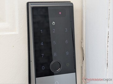 Keypad lit and palm scanning logo lit up.