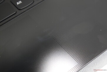 The clickpad doesn't have the glossy dot texture or pattern of the surrounding palm rests. Clickpad is of a decent size (10.5 x 6.5 cm)