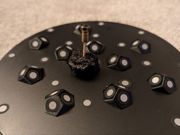 Broken nozzle on turntable with markers