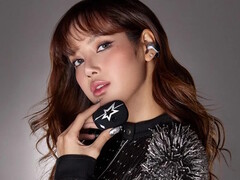 K-pop star LISA wearing the Bose x LISA Ultra Open Earbuds and holding its case. (Image source: Bose)