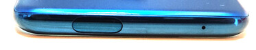 Top: extendable front camera, microphone