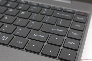 Full-size arrow keys at the cost of a shorter Shift key