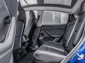 Backseat of a Tesla Model Y. The automaker will bring the child presence detection feature to more models (Image source: MotorTrends)