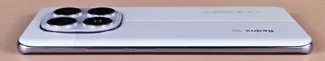 right side of the case (buttons: volume, on/off)