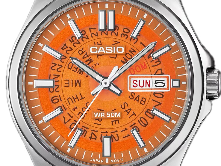 A close up shot of the orange MTP-E740-4AV with its transparent dial revealing the day and display wheels underneath.