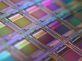 Macro shot of a silicon wafer — structures like these underpin chip designs used in neuromorphic and in-memory computing (Image source: Laura Ockel via Unsplash)