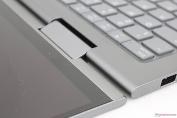 Large hinges are strong at all angles with no teetering when typing or adjusting angles