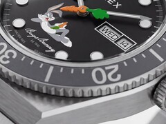 Close-up of the Timex Looney Tunes x M79 Automatic’s black dial, showing Bugs Bunny lounging across the lower half and a carrot-shaped seconds hand at the center.