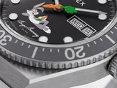Close-up of the Timex Looney Tunes x M79 Automatic’s black dial, showing Bugs Bunny lounging across the lower half and a carrot-shaped seconds hand at the center.