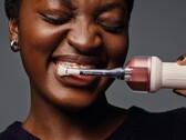 Dyson’s first electric toothbrush cleans between teeth using mouthwash.