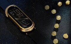The Xiaomi Mi Band wearable gets treated to a gold and diamond makeover in the &quot;Gold Collection&quot;. (Image source: Xiaomi - edited)