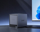 The N3A has four SATA drive bays and two M.2 SSD slots. Pictured: a promo picture showing the NAS placed beside a monitor.