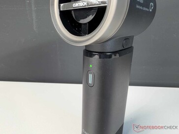 The two buttons and the battery level LED