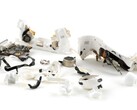The AirPods Pro 3 (pictured here, torn apart) received a deafening 0 out of 10 in repairability from iFixit. (Image source: iFixit)