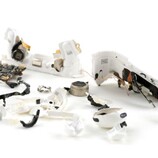 The AirPods Pro 3 (pictured here, torn apart) received a deafening 0 out of 10 in repairability from iFixit. (Image source: iFixit)
